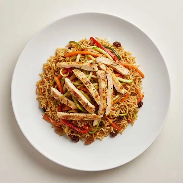 Lemon Roasted Chicken With Vegetable Kabuli Rice & Harissa Sauce